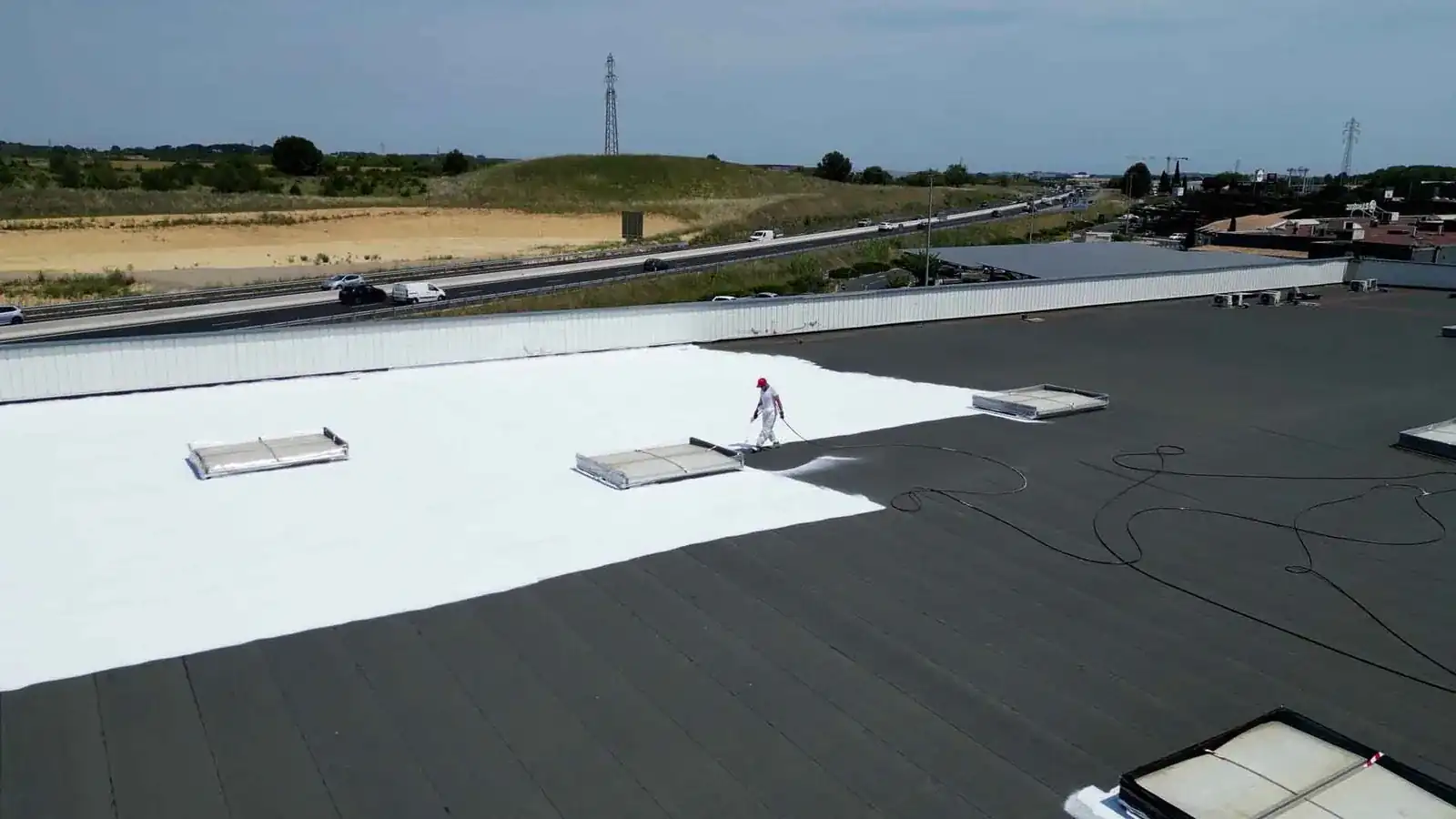 Pulvérisation Cool Roof par cordiste
